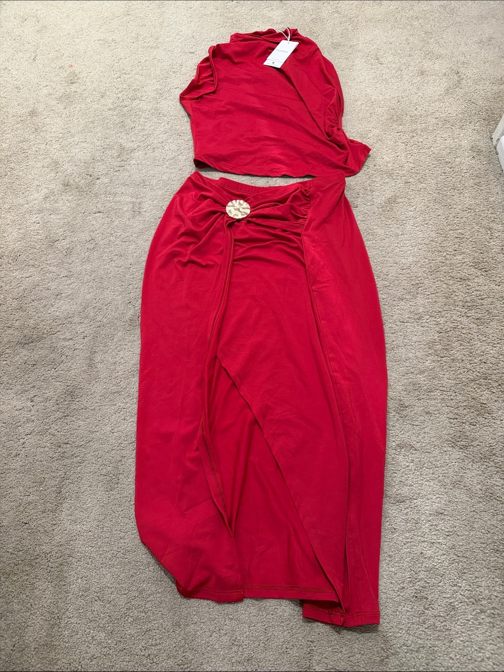 Red High-Slit Maxi Skirt with Decorative Ring